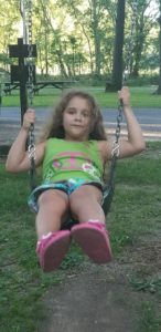 Summer girl on swing
