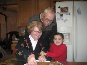 baking Christmas cookies with grandparents